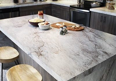 Kitchen island with waterfall countertop self edge and wood cabinets