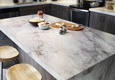 Kitchen island with waterfall countertop self edge and wood cabinets Kitchen island with waterfall countertop self edge and wood cabinets
